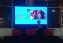 Ilustrasi digital yang melambangkan inovasi kecerdasan buatan dan pertumbuhan bisnis global.