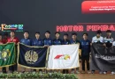 Detail aerodinamis dan komponen mekanis kendaraan hemat energi di meja kerja teknik otomotif
